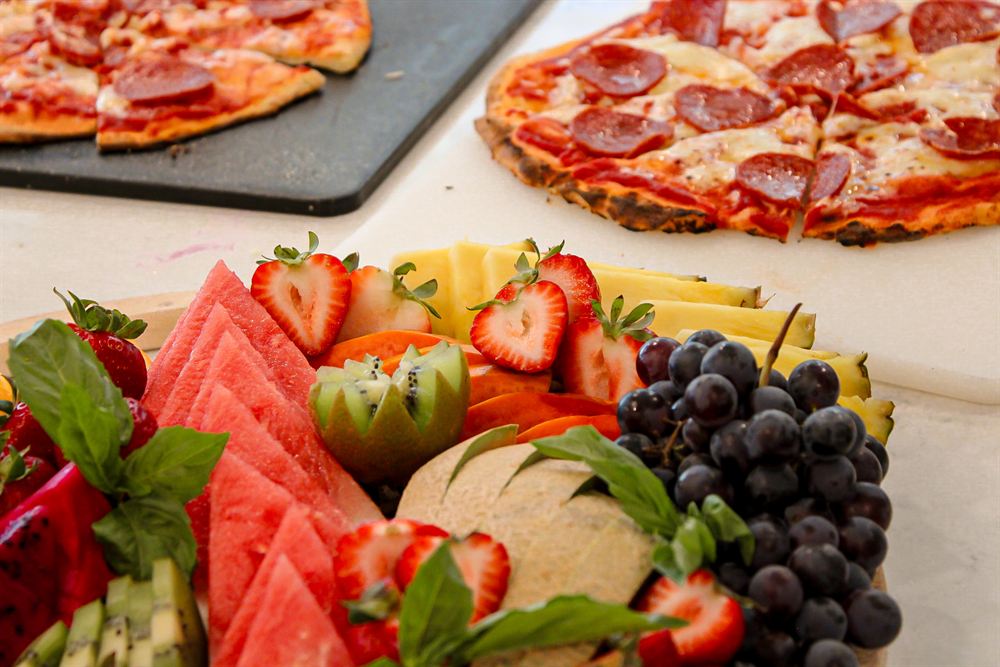 Tropical fruit board arranged on a wood table
