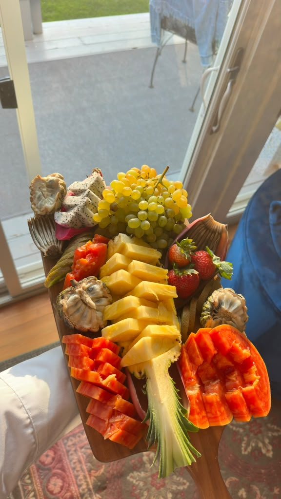 Tropical fruit board with watermelon, dragon fruit and coconut