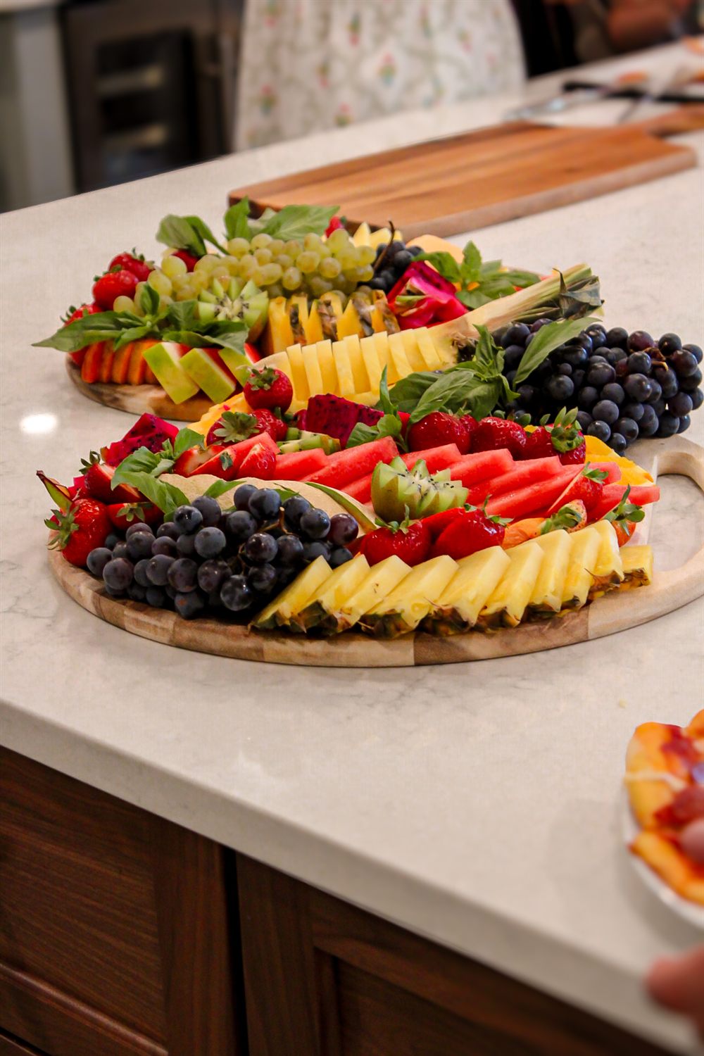 Tropical fruit board with pineapple, dragon fruit and berries prepared by a private chef